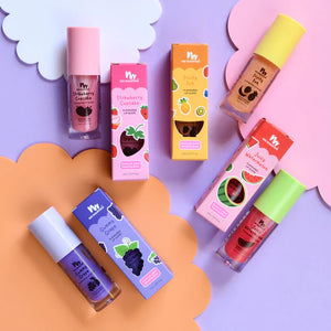 kids lip gloss with packaging on colourful back ground