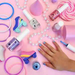 painted blue nails with roller skates and beads 